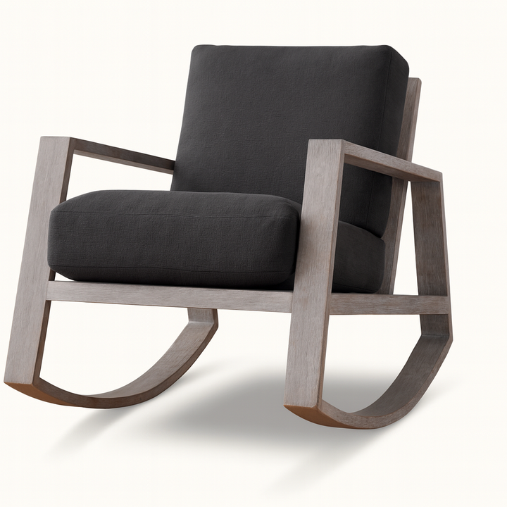 Modern Harvey rocking chair with a weathered wood frame and deep charcoal upholstered cushions, featuring clean angular lines and a contemporary silhouette.