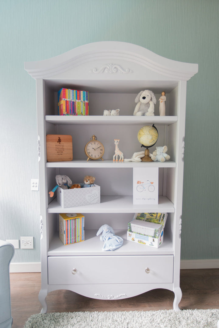 Hand-crafted Auriga Bookshelf - Handcrafted white nursery bookshelf with arched crown and carved detailing, part of the Baby Belle furniture collection